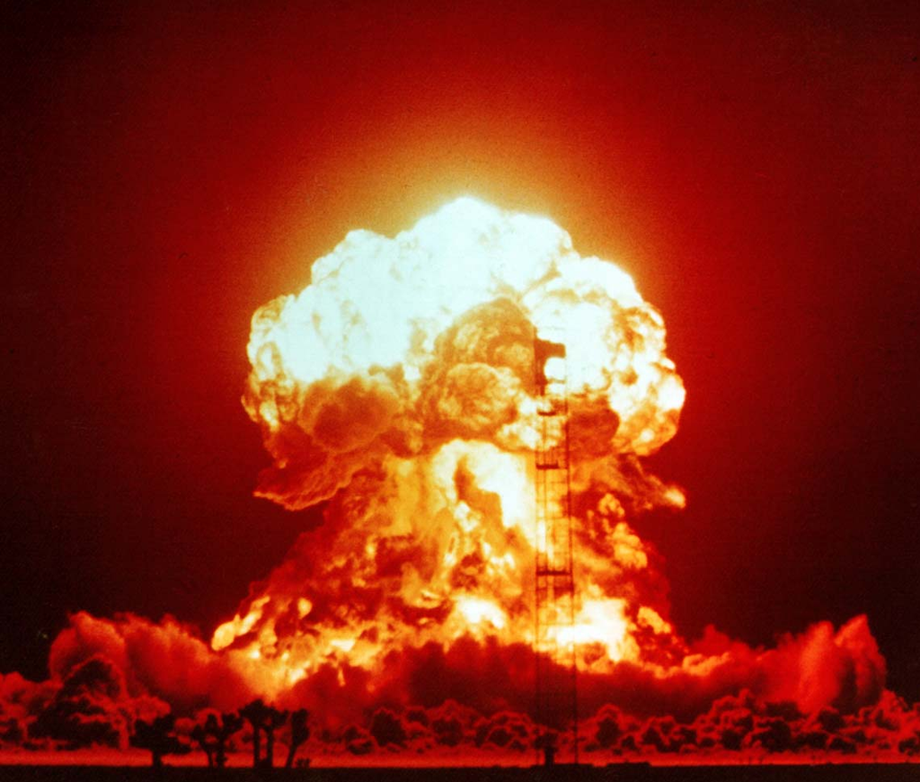 The last word in problem solving. (Image of a nuclear blast)