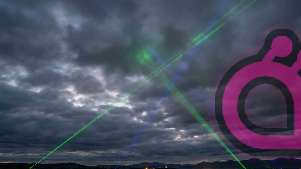 Mognadsfas som begrepp beskrivs med en mörk himmel och två korsade laserstrålar.